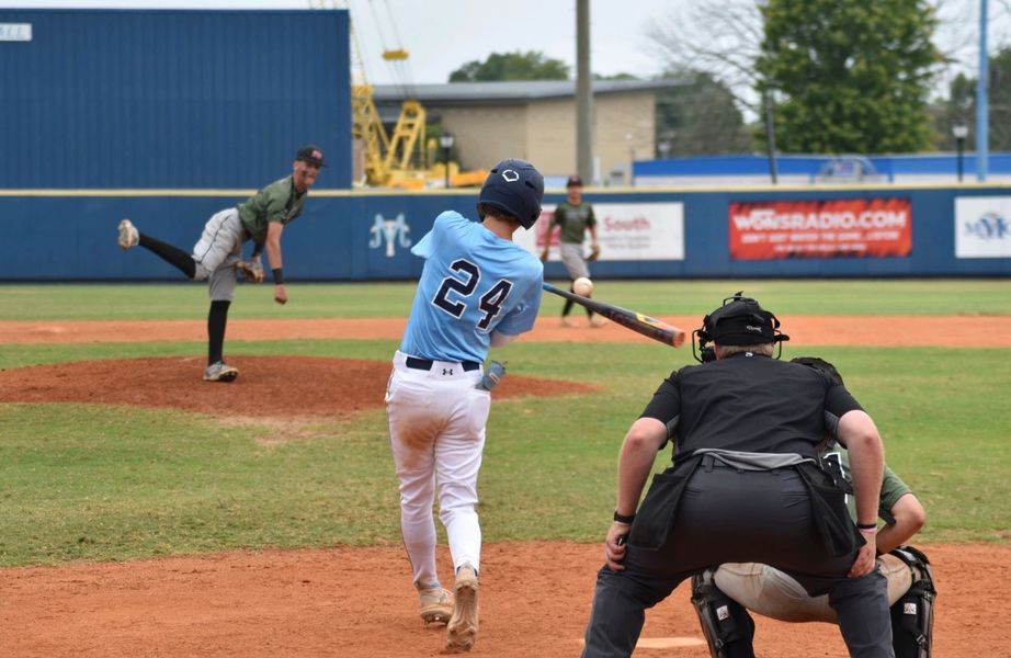 Player getting tagged sliding into base