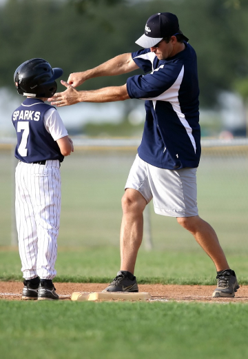 Young athlete engaged in baseball training