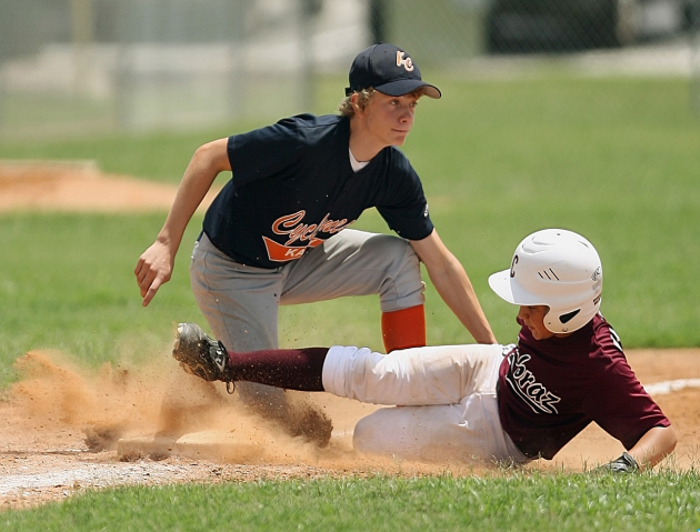 Young athlete engaged in baseball training at Apex Performance Gym's well-equipped indoor facility