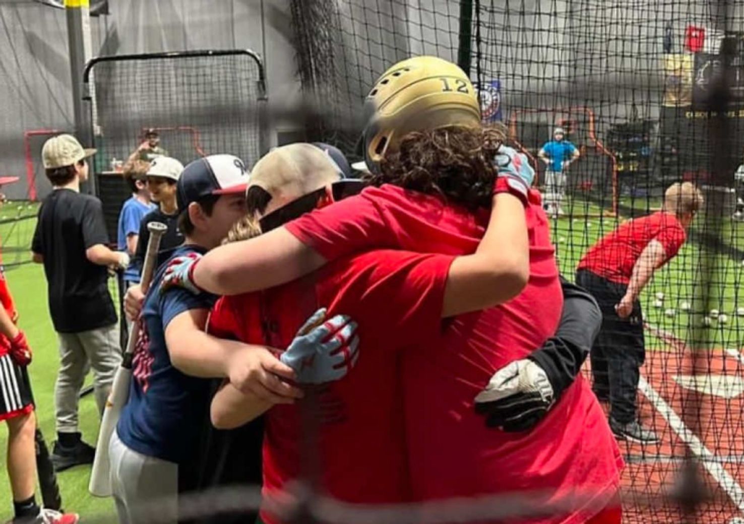 Team celebrating at HitTrax hitting league